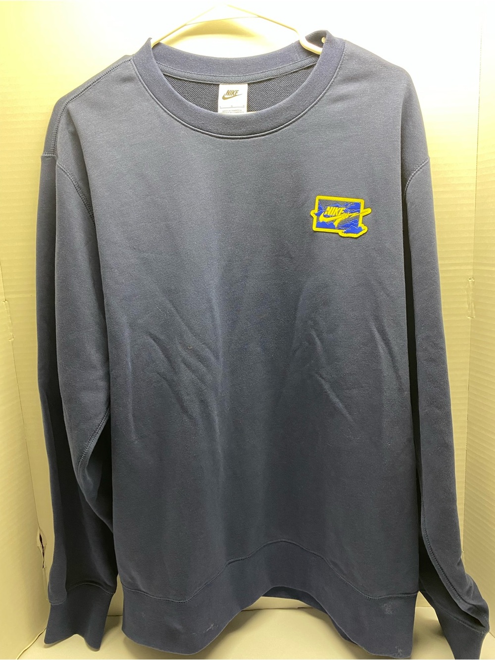 Nike Men's Navy Crewneck Sweatshirt with Yellow Accent Patch